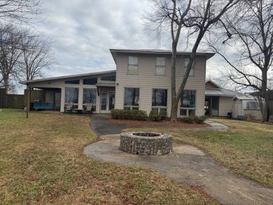 This stunningly renovated 5-bedroom, 3-bath ranch-style home on Lake Bruin Golf and Country Club in Louisiana - for sale on GolfHomes.com, golf home, golf lot