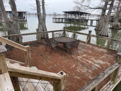 This stunningly renovated 5-bedroom, 3-bath ranch-style home on Lake Bruin Golf and Country Club in Louisiana - for sale on GolfHomes.com, golf home, golf lot