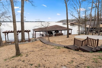 Stunning waterfront property located on Lake Cypress Springs in on Cypress Creek Country Club in Texas - for sale on GolfHomes.com, golf home, golf lot