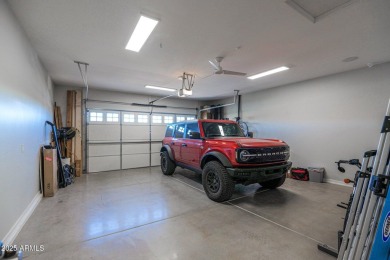 This STUNNING home located within Sun City Anthem at Merrill on Poston Butte Golf Club in Arizona - for sale on GolfHomes.com, golf home, golf lot