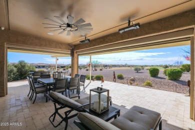 This STUNNING home located within Sun City Anthem at Merrill on Poston Butte Golf Club in Arizona - for sale on GolfHomes.com, golf home, golf lot