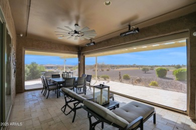 This STUNNING home located within Sun City Anthem at Merrill on Poston Butte Golf Club in Arizona - for sale on GolfHomes.com, golf home, golf lot