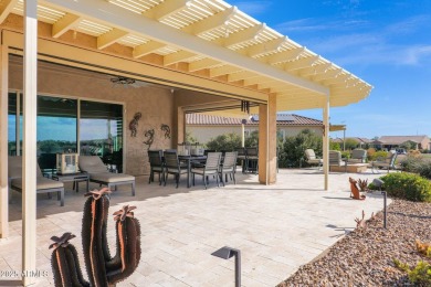 This STUNNING home located within Sun City Anthem at Merrill on Poston Butte Golf Club in Arizona - for sale on GolfHomes.com, golf home, golf lot