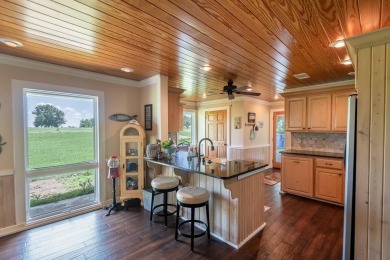 This stunningly renovated 5-bedroom, 3-bath ranch-style home on Lake Bruin Golf and Country Club in Louisiana - for sale on GolfHomes.com, golf home, golf lot
