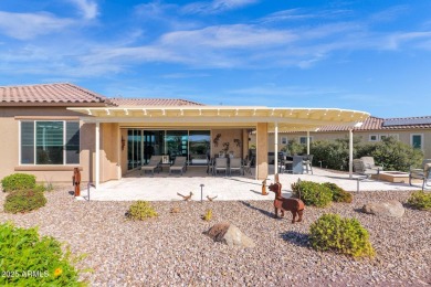 This STUNNING home located within Sun City Anthem at Merrill on Poston Butte Golf Club in Arizona - for sale on GolfHomes.com, golf home, golf lot