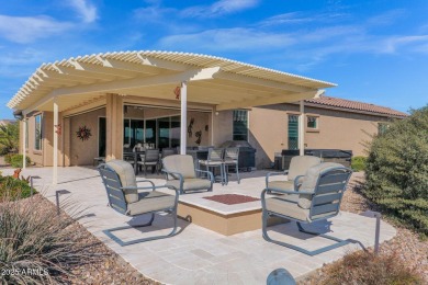 This STUNNING home located within Sun City Anthem at Merrill on Poston Butte Golf Club in Arizona - for sale on GolfHomes.com, golf home, golf lot