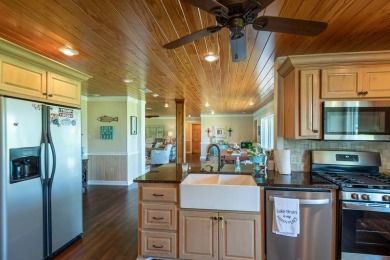 This stunningly renovated 5-bedroom, 3-bath ranch-style home on Lake Bruin Golf and Country Club in Louisiana - for sale on GolfHomes.com, golf home, golf lot
