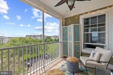 Discover your dream retreat in this stunning top-floor end unit on Bayside Resort Golf Club in Delaware - for sale on GolfHomes.com, golf home, golf lot