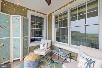 Discover your dream retreat in this stunning top-floor end unit on Bayside Resort Golf Club in Delaware - for sale on GolfHomes.com, golf home, golf lot
