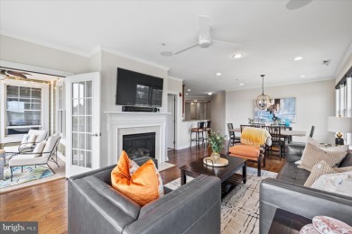 Discover your dream retreat in this stunning top-floor end unit on Bayside Resort Golf Club in Delaware - for sale on GolfHomes.com, golf home, golf lot