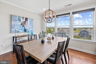 Discover your dream retreat in this stunning top-floor end unit on Bayside Resort Golf Club in Delaware - for sale on GolfHomes.com, golf home, golf lot