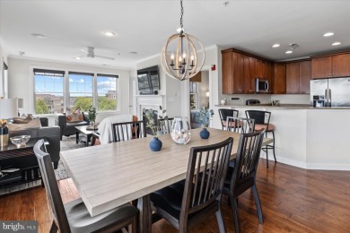 Discover your dream retreat in this stunning top-floor end unit on Bayside Resort Golf Club in Delaware - for sale on GolfHomes.com, golf home, golf lot
