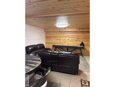 This big beautiful home has been used as a rental and has  made on Island Park Village Resort Golf Course in Idaho - for sale on GolfHomes.com, golf home, golf lot