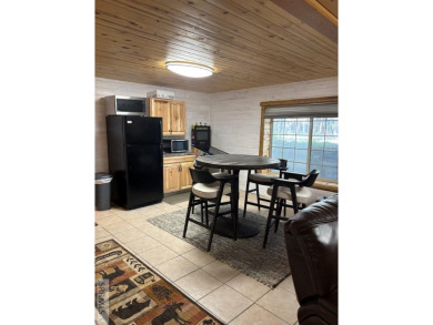 This big beautiful home has been used as a rental and has  made on Island Park Village Resort Golf Course in Idaho - for sale on GolfHomes.com, golf home, golf lot