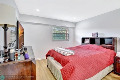 This  2 bd /1.5 bath features laminated floors throughout on Flamingo Lakes Country Club in Florida - for sale on GolfHomes.com, golf home, golf lot