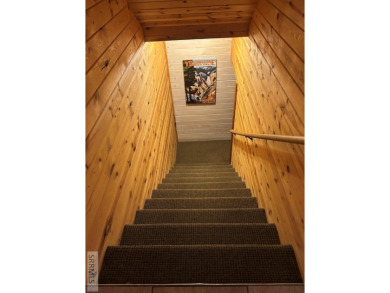 This big beautiful home has been used as a rental and has  made on Island Park Village Resort Golf Course in Idaho - for sale on GolfHomes.com, golf home, golf lot