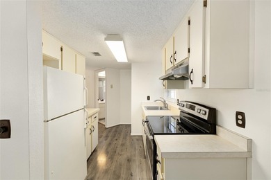 Wow, what a view and talk about Adorable!! Immaculate 2-bedroom on Country Club At Silver Springs Shores in Florida - for sale on GolfHomes.com, golf home, golf lot