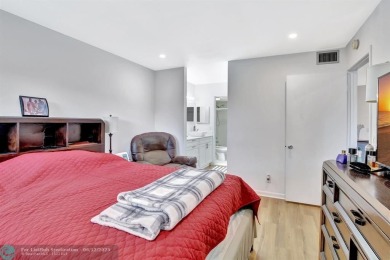 This  2 bd /1.5 bath features laminated floors throughout on Flamingo Lakes Country Club in Florida - for sale on GolfHomes.com, golf home, golf lot
