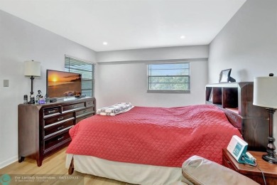 This  2 bd /1.5 bath features laminated floors throughout on Flamingo Lakes Country Club in Florida - for sale on GolfHomes.com, golf home, golf lot