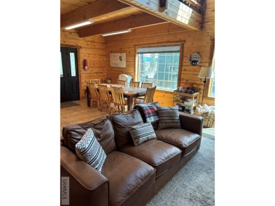 This big beautiful home has been used as a rental and has  made on Island Park Village Resort Golf Course in Idaho - for sale on GolfHomes.com, golf home, golf lot