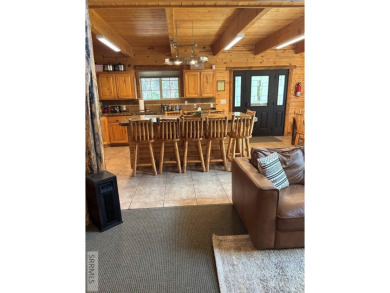 This big beautiful home has been used as a rental and has  made on Island Park Village Resort Golf Course in Idaho - for sale on GolfHomes.com, golf home, golf lot