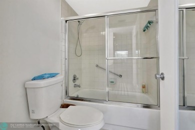 This  2 bd /1.5 bath features laminated floors throughout on Flamingo Lakes Country Club in Florida - for sale on GolfHomes.com, golf home, golf lot