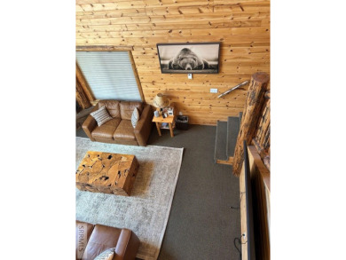 This big beautiful home has been used as a rental and has  made on Island Park Village Resort Golf Course in Idaho - for sale on GolfHomes.com, golf home, golf lot