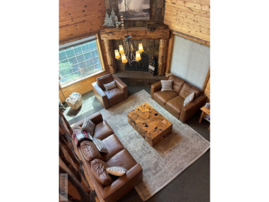 This big beautiful home has been used as a rental and has  made on Island Park Village Resort Golf Course in Idaho - for sale on GolfHomes.com, golf home, golf lot