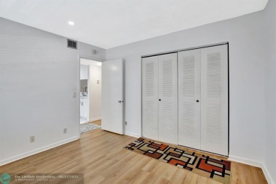 This  2 bd /1.5 bath features laminated floors throughout on Flamingo Lakes Country Club in Florida - for sale on GolfHomes.com, golf home, golf lot