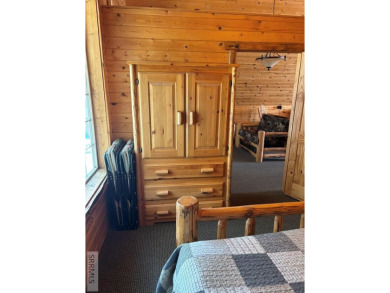 This big beautiful home has been used as a rental and has  made on Island Park Village Resort Golf Course in Idaho - for sale on GolfHomes.com, golf home, golf lot