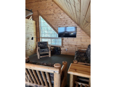 This big beautiful home has been used as a rental and has  made on Island Park Village Resort Golf Course in Idaho - for sale on GolfHomes.com, golf home, golf lot