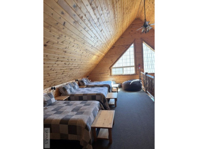 This big beautiful home has been used as a rental and has  made on Island Park Village Resort Golf Course in Idaho - for sale on GolfHomes.com, golf home, golf lot