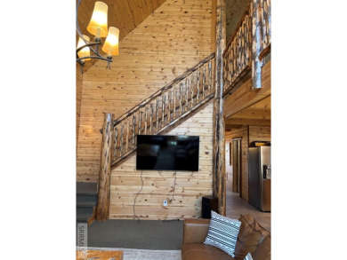 This big beautiful home has been used as a rental and has  made on Island Park Village Resort Golf Course in Idaho - for sale on GolfHomes.com, golf home, golf lot