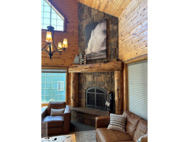 This big beautiful home has been used as a rental and has  made on Island Park Village Resort Golf Course in Idaho - for sale on GolfHomes.com, golf home, golf lot