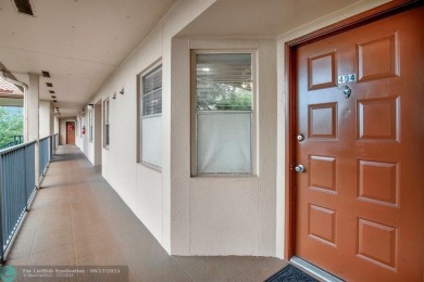 This  2 bd /1.5 bath features laminated floors throughout on Flamingo Lakes Country Club in Florida - for sale on GolfHomes.com, golf home, golf lot