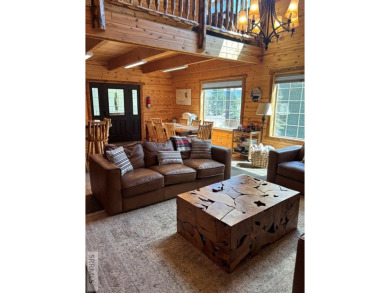 This big beautiful home has been used as a rental and has  made on Island Park Village Resort Golf Course in Idaho - for sale on GolfHomes.com, golf home, golf lot
