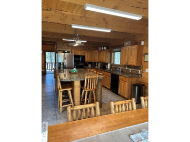 This big beautiful home has been used as a rental and has  made on Island Park Village Resort Golf Course in Idaho - for sale on GolfHomes.com, golf home, golf lot