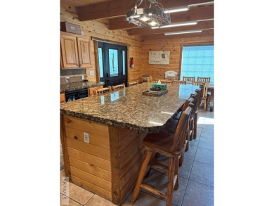 This big beautiful home has been used as a rental and has  made on Island Park Village Resort Golf Course in Idaho - for sale on GolfHomes.com, golf home, golf lot