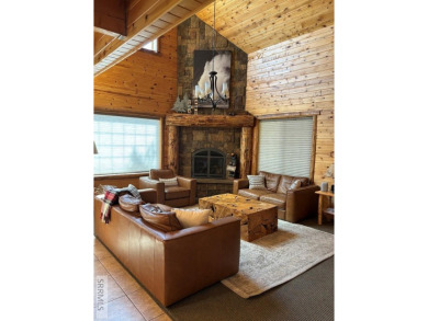 This big beautiful home has been used as a rental and has  made on Island Park Village Resort Golf Course in Idaho - for sale on GolfHomes.com, golf home, golf lot