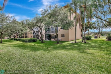 This  2 bd /1.5 bath features laminated floors throughout on Flamingo Lakes Country Club in Florida - for sale on GolfHomes.com, golf home, golf lot