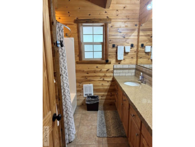 This big beautiful home has been used as a rental and has  made on Island Park Village Resort Golf Course in Idaho - for sale on GolfHomes.com, golf home, golf lot
