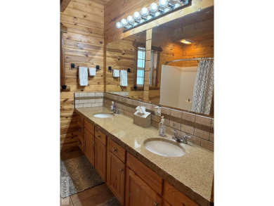 This big beautiful home has been used as a rental and has  made on Island Park Village Resort Golf Course in Idaho - for sale on GolfHomes.com, golf home, golf lot
