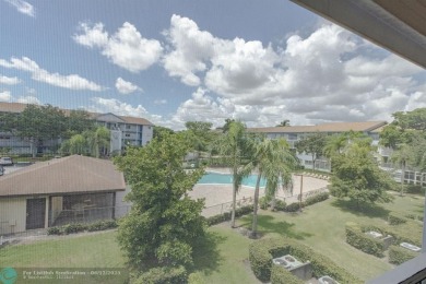 This  2 bd /1.5 bath features laminated floors throughout on Flamingo Lakes Country Club in Florida - for sale on GolfHomes.com, golf home, golf lot