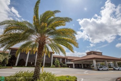 This  2 bd /1.5 bath features laminated floors throughout on Flamingo Lakes Country Club in Florida - for sale on GolfHomes.com, golf home, golf lot