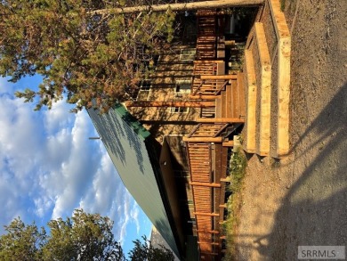 This big beautiful home has been used as a rental and has  made on Island Park Village Resort Golf Course in Idaho - for sale on GolfHomes.com, golf home, golf lot
