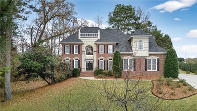 This stunning home in the prestigious gated with security guard on Whitewater Creek in Georgia - for sale on GolfHomes.com, golf home, golf lot