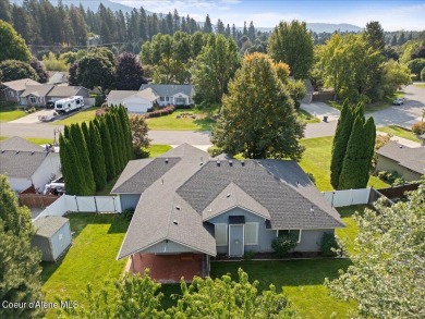 SINGLE-LEVEL  HOME IN HAYDEN'S WOODLAND MEADOWS. Woodland on Hayden Lake Country Club in Idaho - for sale on GolfHomes.com, golf home, golf lot