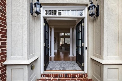 This stunning home in the prestigious gated with security guard on Whitewater Creek in Georgia - for sale on GolfHomes.com, golf home, golf lot