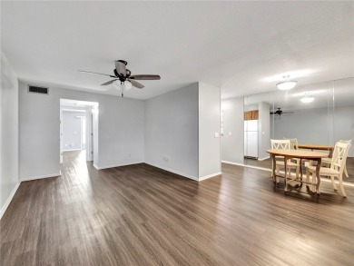 Live the relaxed Florida lifestyle in this desirable 1st floor on Vero Beach South Golf Course in Florida - for sale on GolfHomes.com, golf home, golf lot