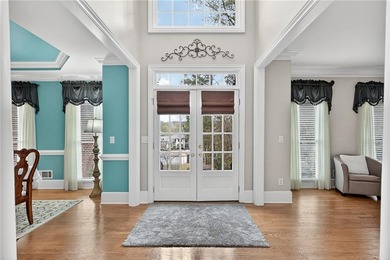 This stunning home in the prestigious gated with security guard on Whitewater Creek in Georgia - for sale on GolfHomes.com, golf home, golf lot